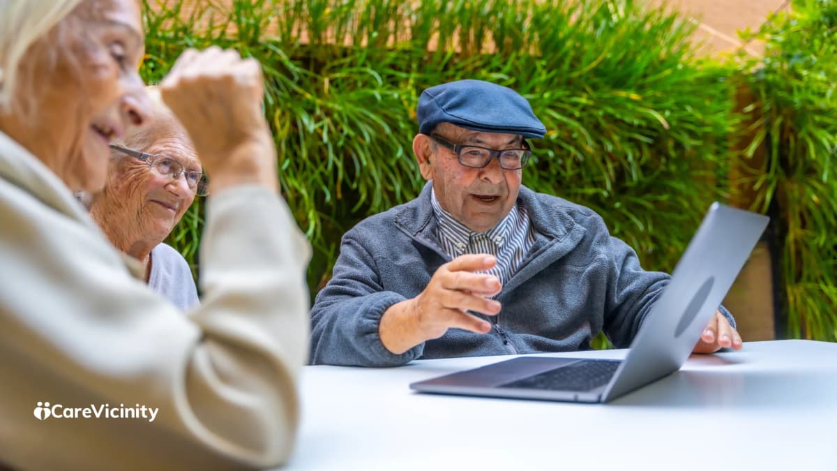 Older couple looking at a laptop together at home
