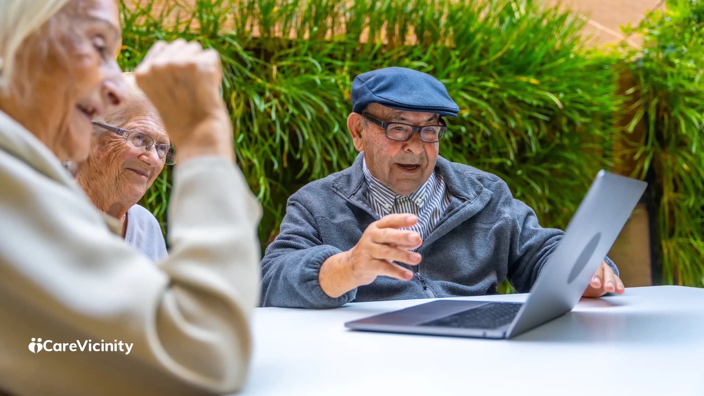 Older couple looking at a laptop together at home
