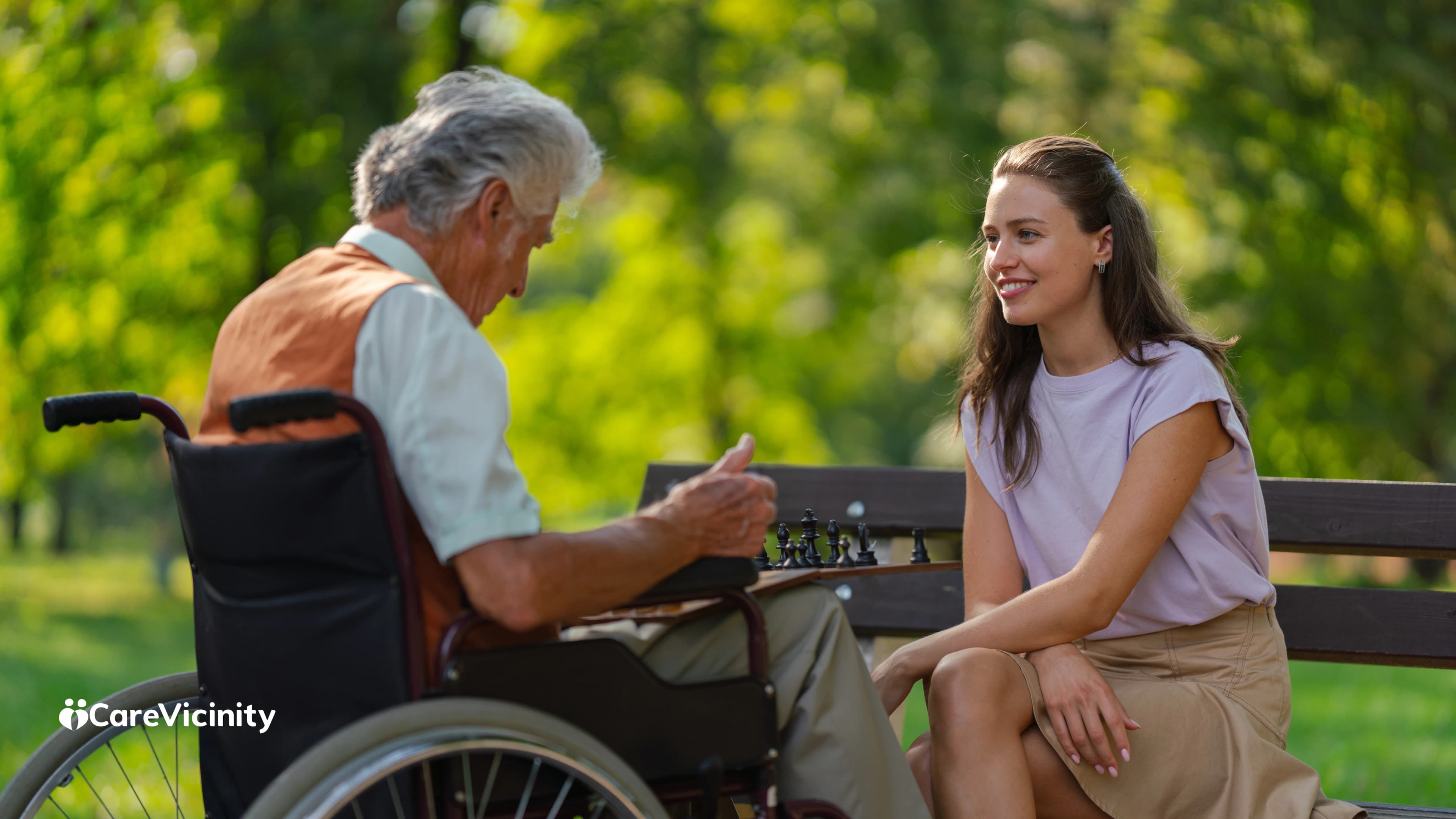Older woman applying online for a My Aged Care assessment at her kitchen table