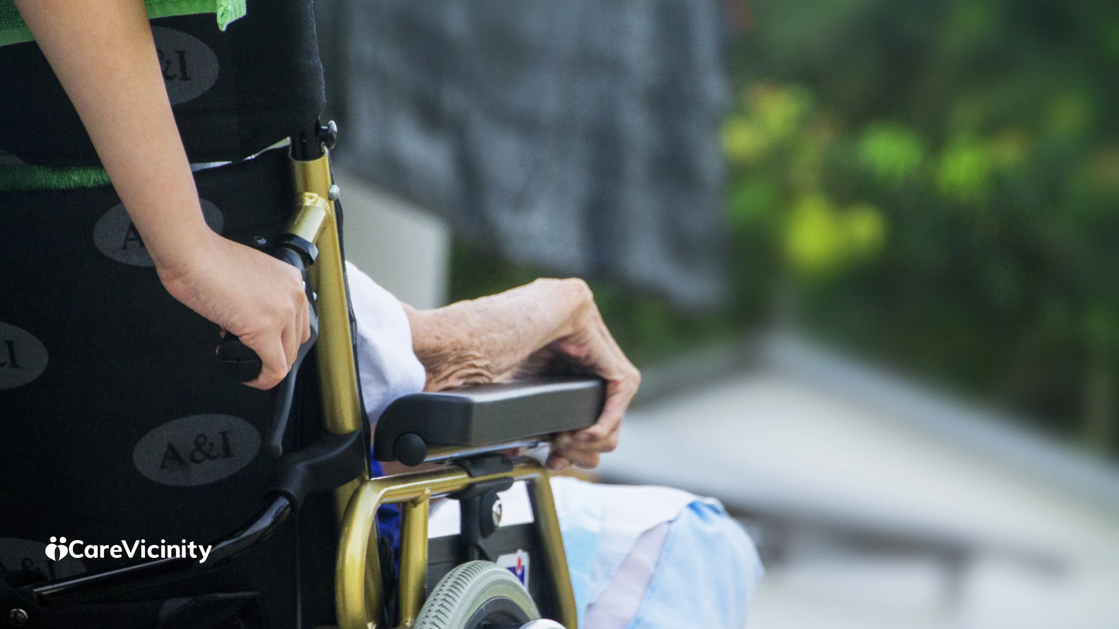 Older woman at home with her daughter and a paid support worker
